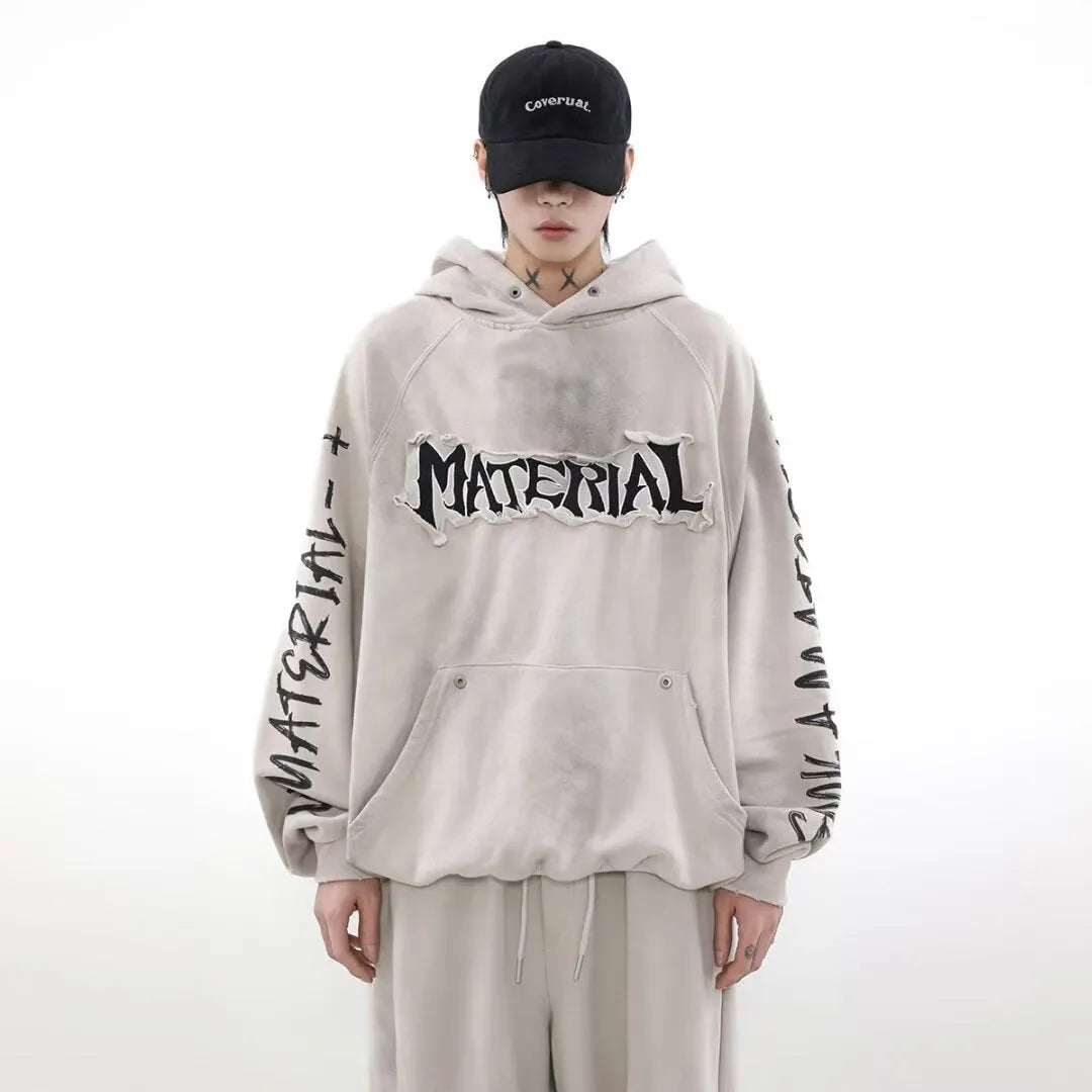 American vintage distressed graffiti hoodie in black, loose fit pullover, long sleeve, polyester fabric