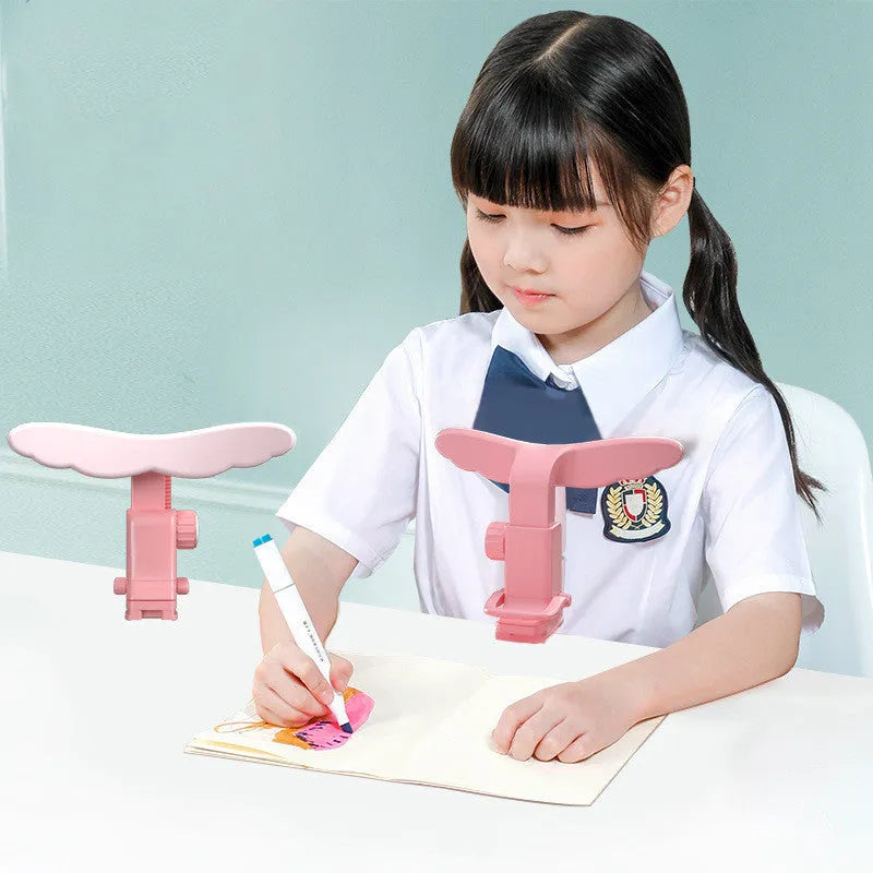 Student anti-myopia orthosis in blue silicone and ABS on a desk, seated posture bracket for corrective sitting