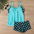 Women's high-waisted polka dot swimsuit boxer briefs in polyester fabric, shown in multiple colours.