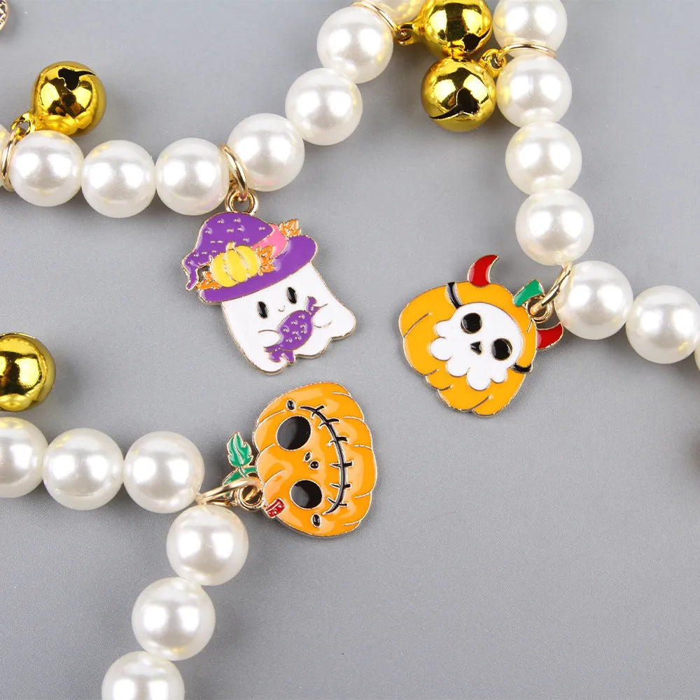 Halloween cat collar decorated with simulated pearls in a pumpkin design on a pet