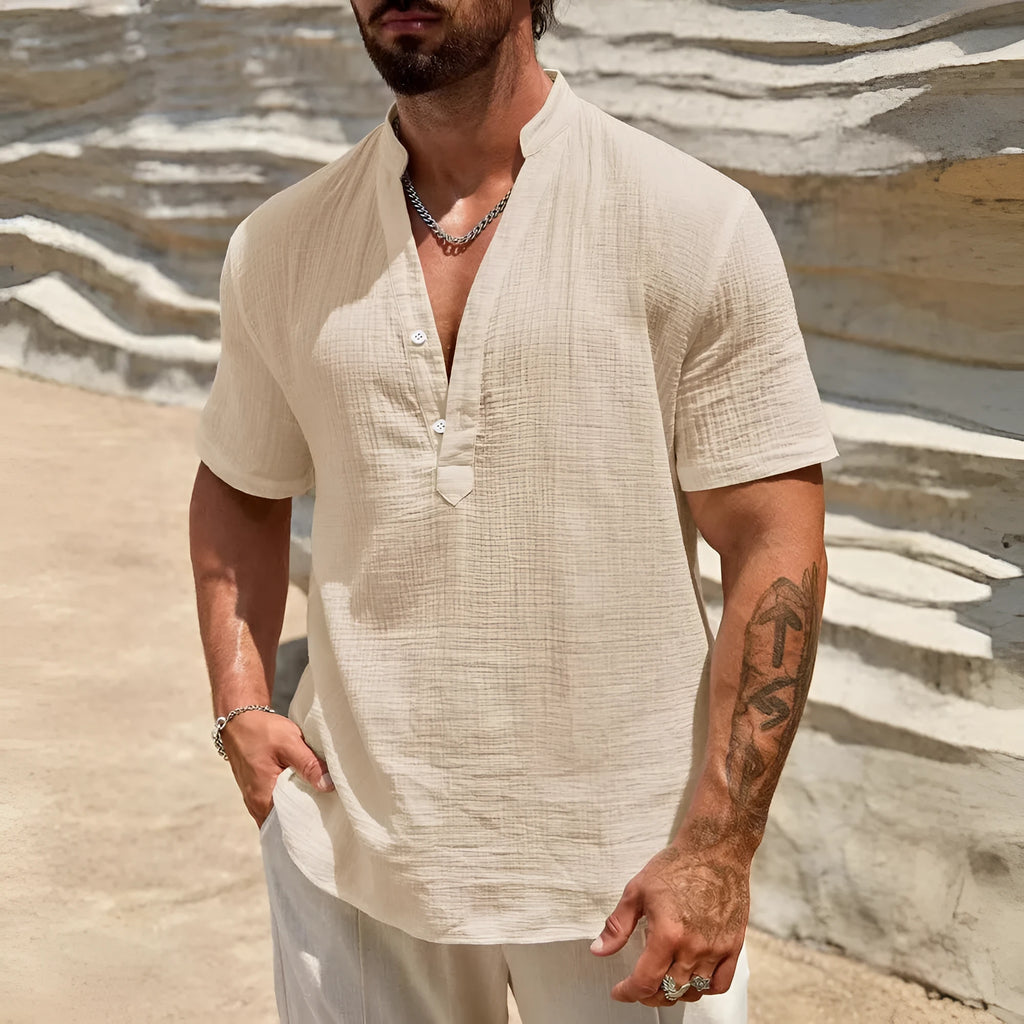 Men's solid colour short-sleeved casual shirt with a stand collar, shown in a light blue colour.