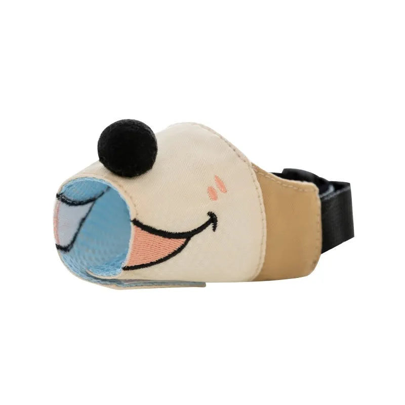 A canvas dog muzzle in Ollie Brown Bear colour, showing the basket design and adjustable head strap.