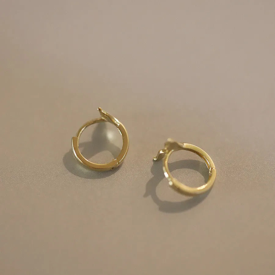 S925 sterling silver fishtail earrings with 14k gold plating in gold and white gold colours