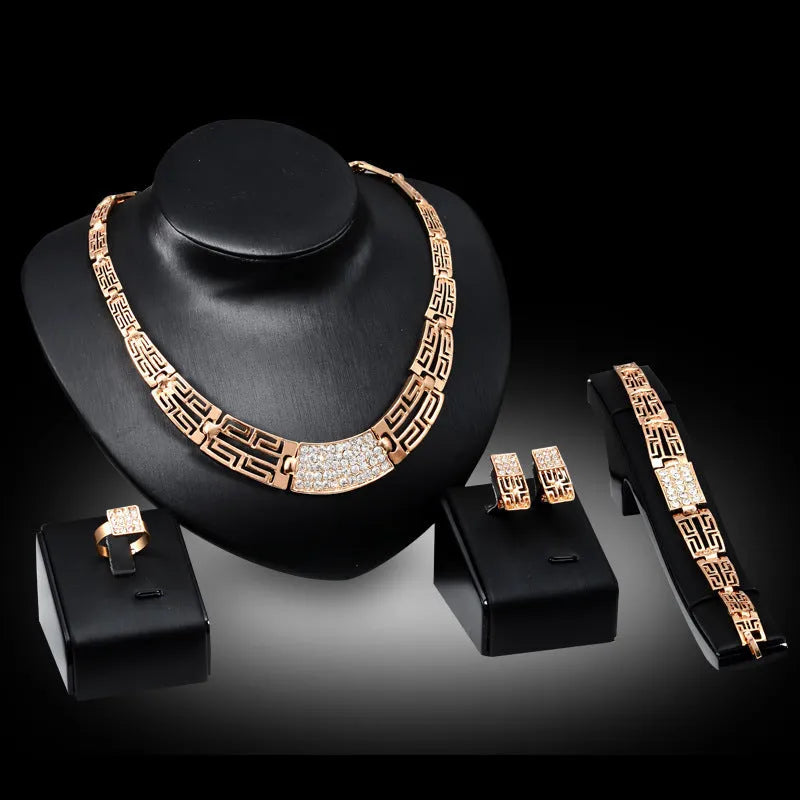 18K gold plated alloy women's jewelry set with star sun moon cloud universe motifs on diamond pattern surface