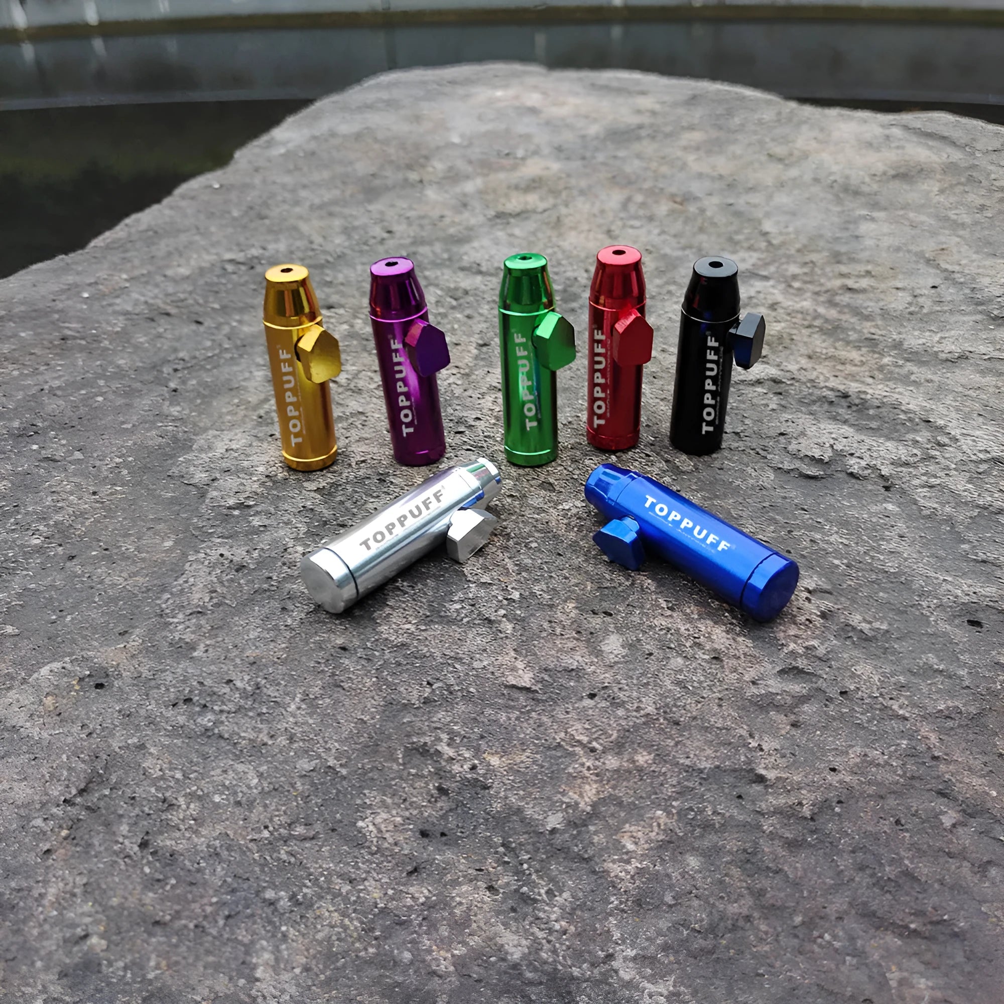 Aluminium alloy bullet-shaped cigarette holder with a flat head, shown in multiple colour options.