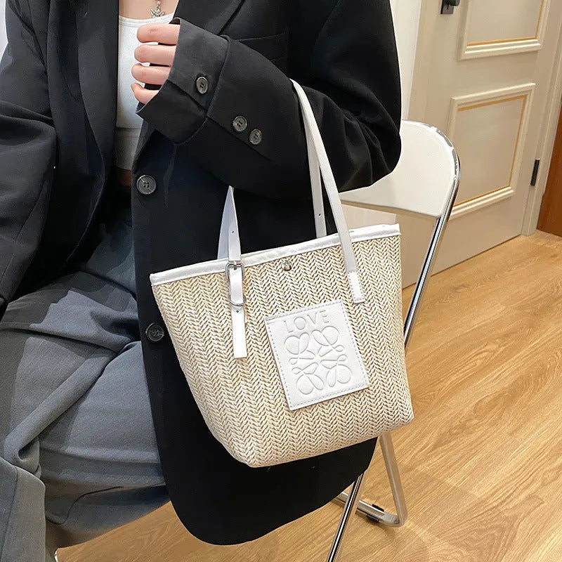 Women's woven straw shoulder bag in European American retro style with three-dimensional pockets