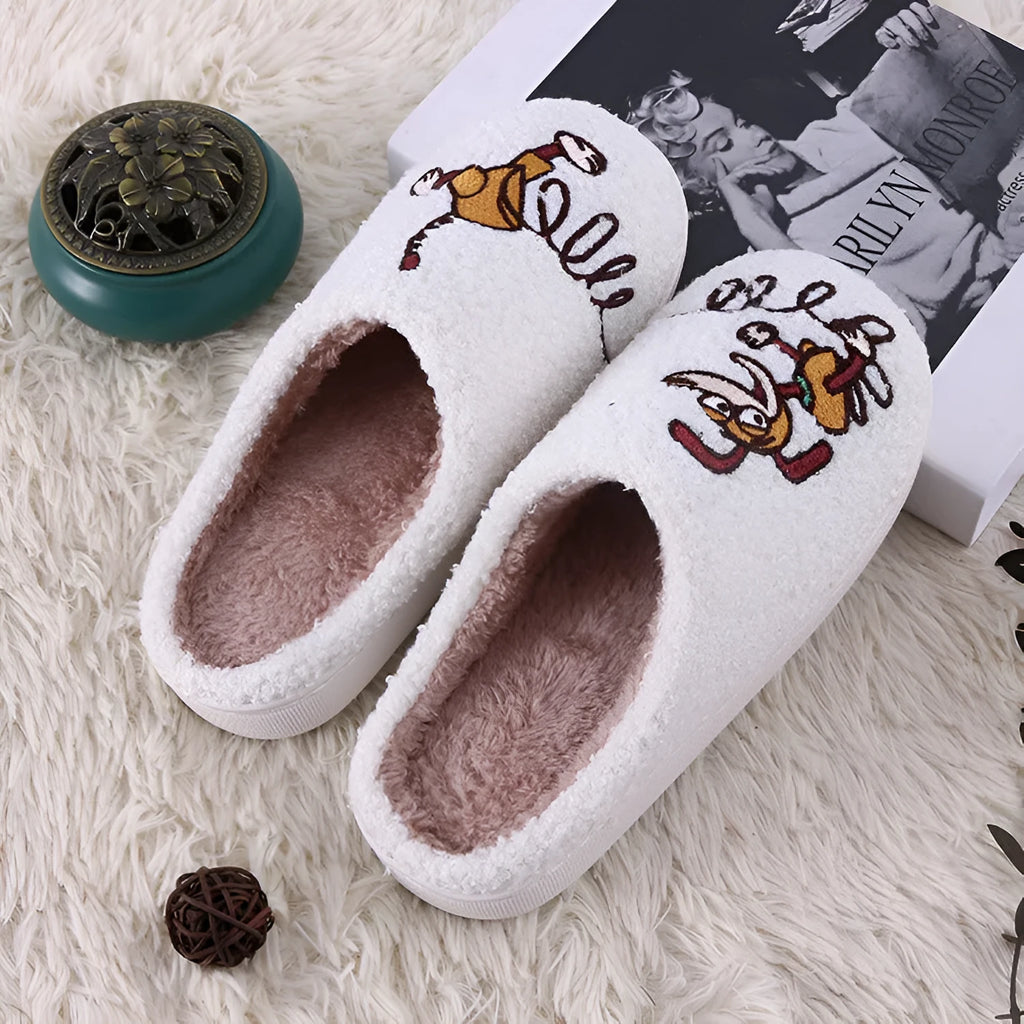 White fluffy slippers with cartoon pattern, rubber soles, and artificial wool lining