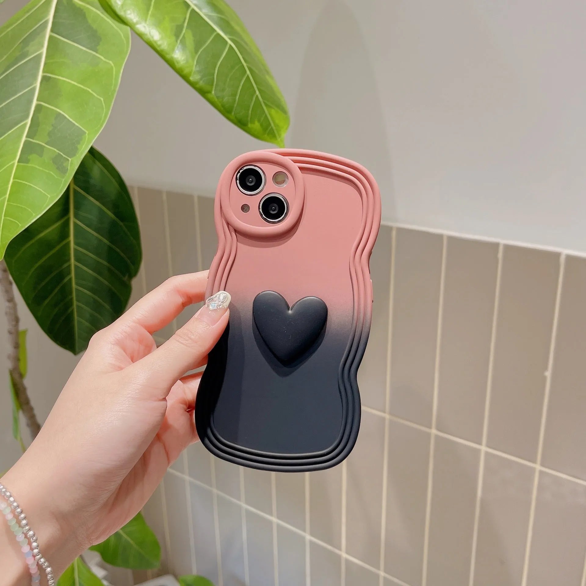 Liquid silicone love heart wavy edge phone case in red gradient black for iPhone 14 Pro Max