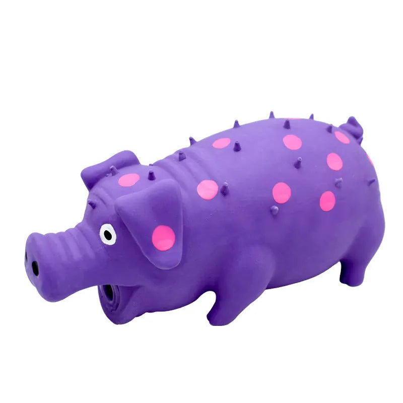 Blue latex squeaky pig dog chew toy with textured surface for teeth cleaning, shown next to tape measure showing 20cm length