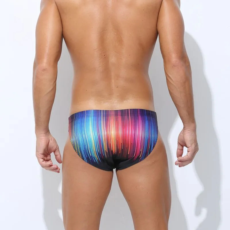 Men's printed swimming trunks in a choice of patterns including skull, streamer, cyber, and ice cream designs.