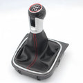 Leather gear lever handball with dust boot for Volkswagen Golf models on a car interior.