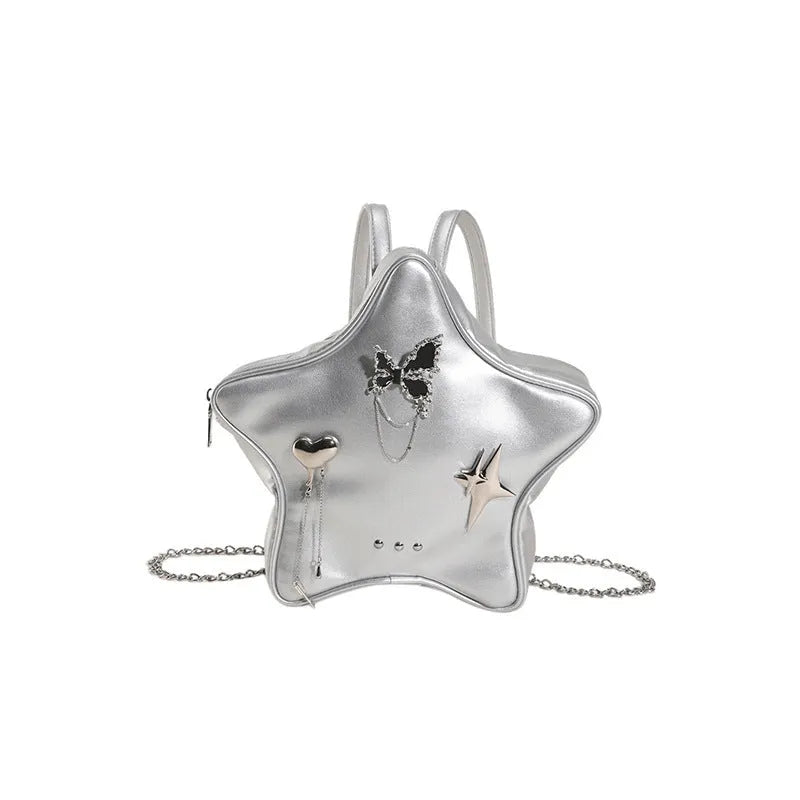 Soft PU leather women's mini backpack in black, shown being worn cross-body.