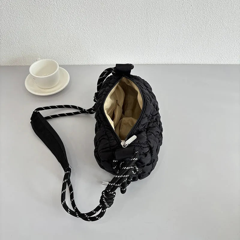 Women's lightweight nylon messenger bag in pillow shape with rhombus pattern and adjustable strap