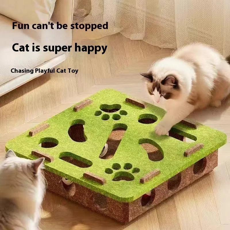 Green brown felt cat toy box with a square hole, measuring 30 cm, on a wooden floor.