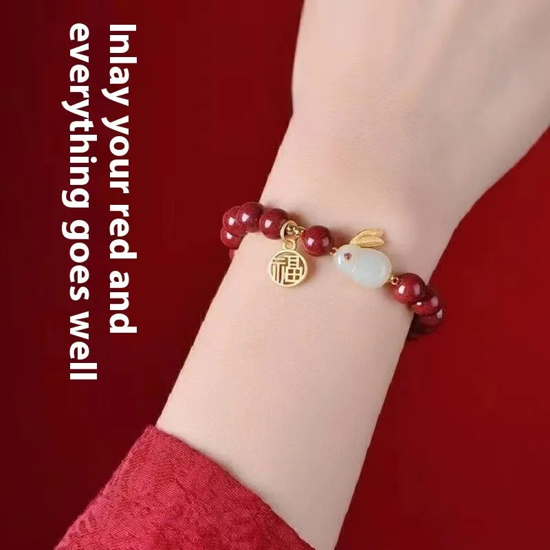 Purple gold sand cinnabar bracelet with jade hare charm, shown with 6mm and 8mm bead size options.