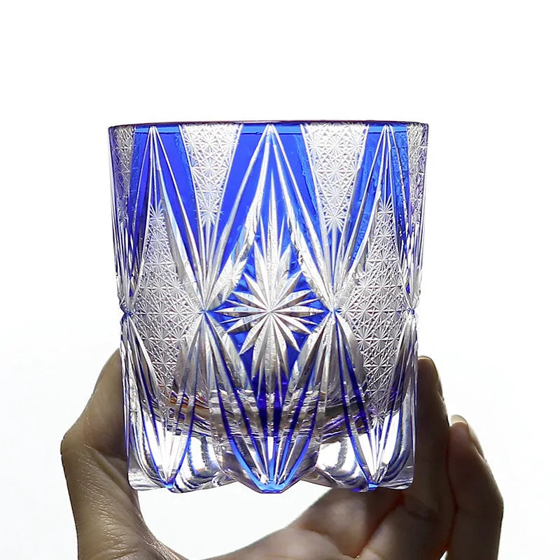 Blue hand carved crystal wine glass with 260ml capacity, retro Japanese style, on a table