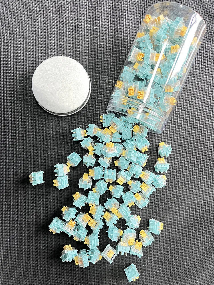 36 Sea Salt Lemon coloured PRO Mute keyboard switch shafts arranged in a pack.
