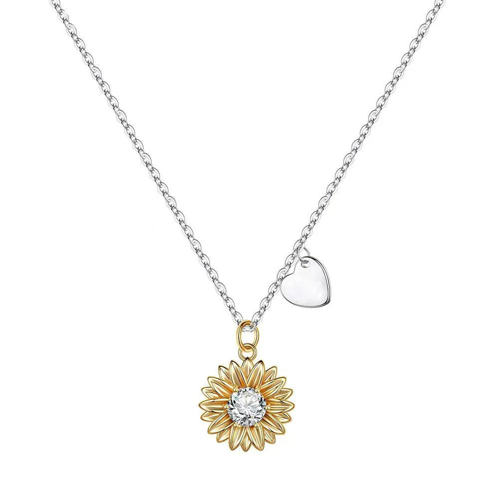 Close-up of a women's adjustable sunflower necklace in 925 silver with a geometric daisy petal pendant.