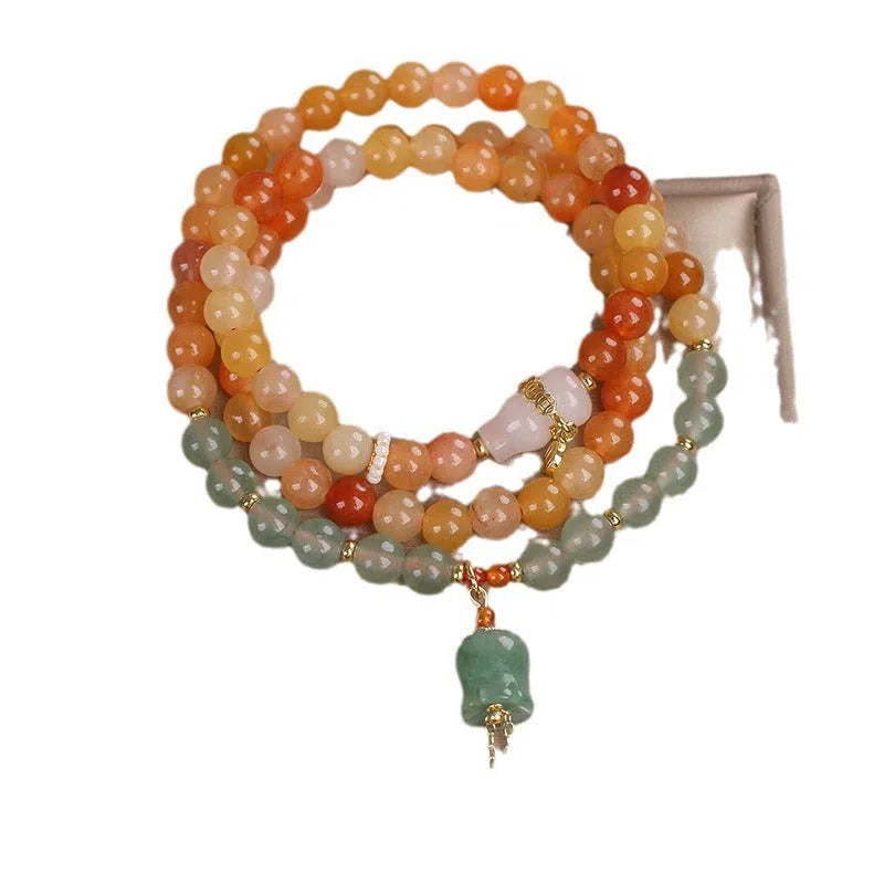 Multi-layer Jinsi Jade beaded bracelet with three circles and lily motif, ethnic style women's jewellery