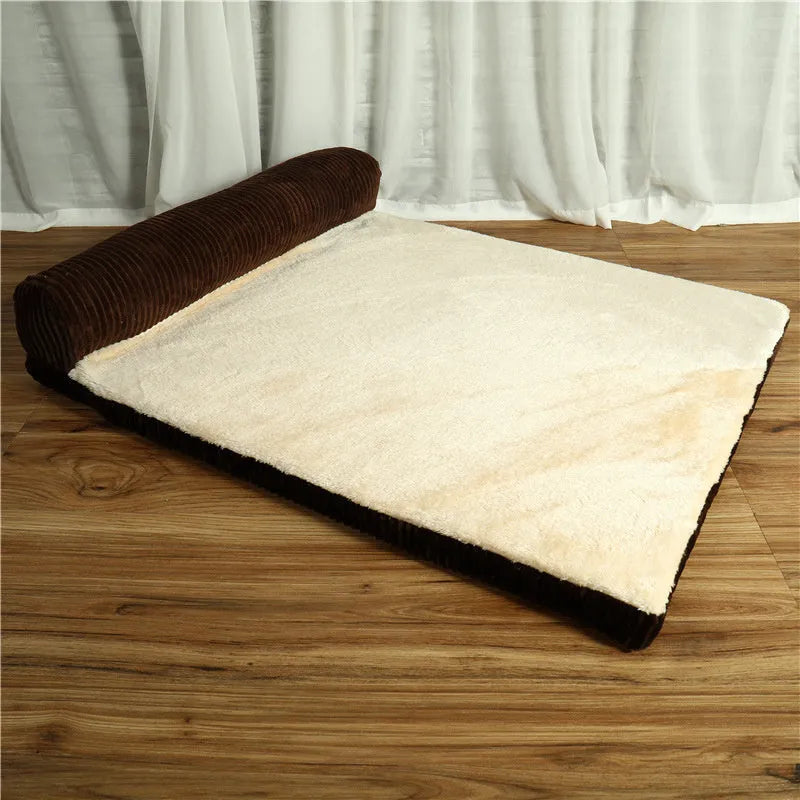 Corduroy pet dog sofa with bolster sides on a non-slip cloth base, shown in grey colour.