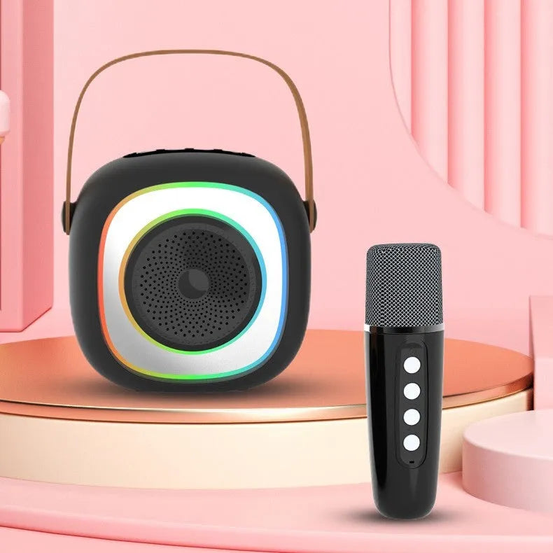 Wireless karaoke microphone in black with wheat detailing showing Bluetooth connectivity and lighting functions