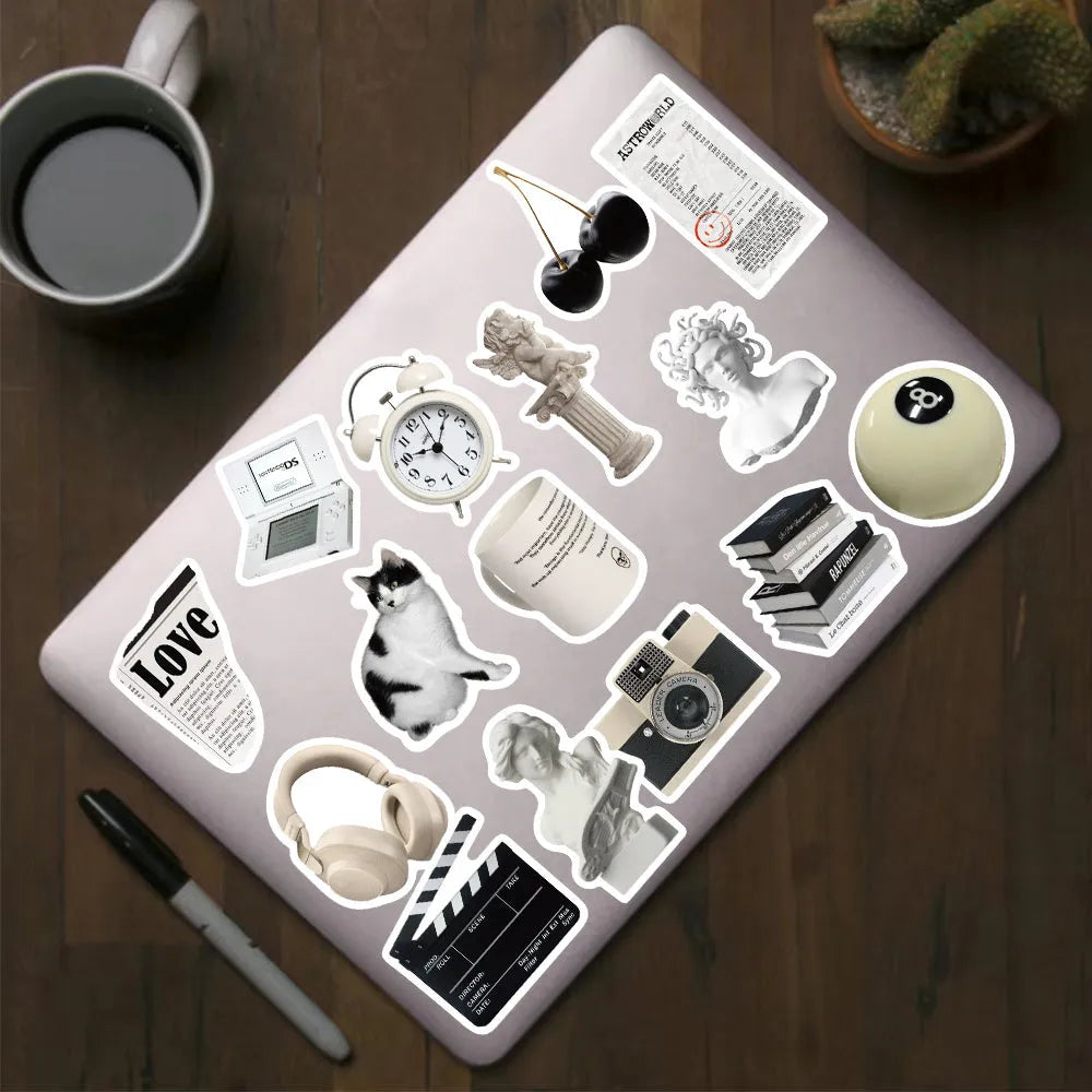 A pack of 61 black and white simple design waterproof PVC stickers for laptops and luggage.