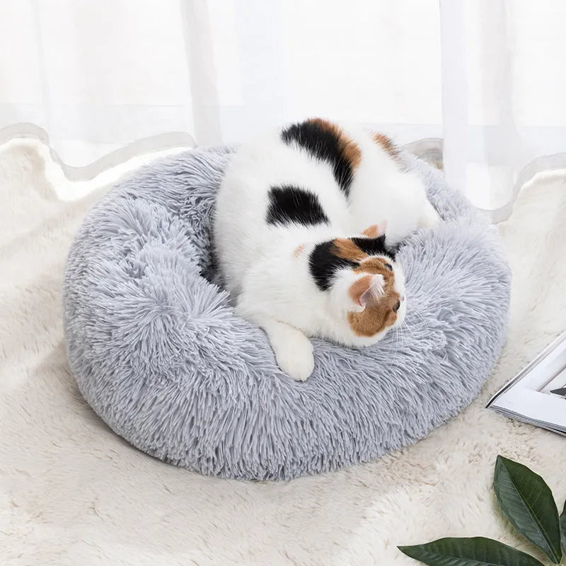 Round cloth cat bed in winter warm design, available in 30cm to 100cm diameters and six colours.