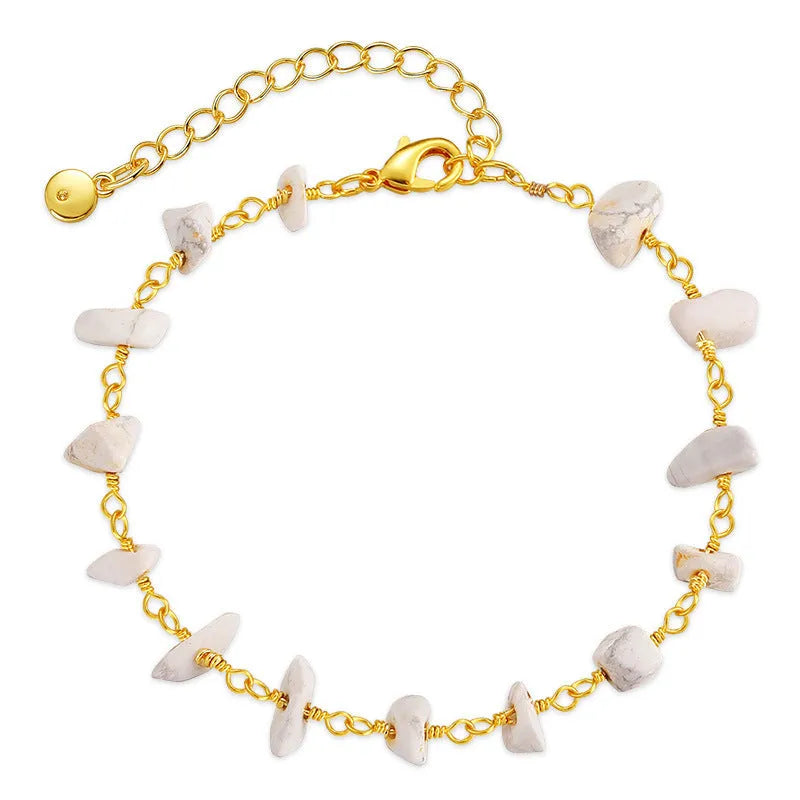 Women's bracelet with irregular gravel turquoise stones and geometric crystals in 18K gold plated copper