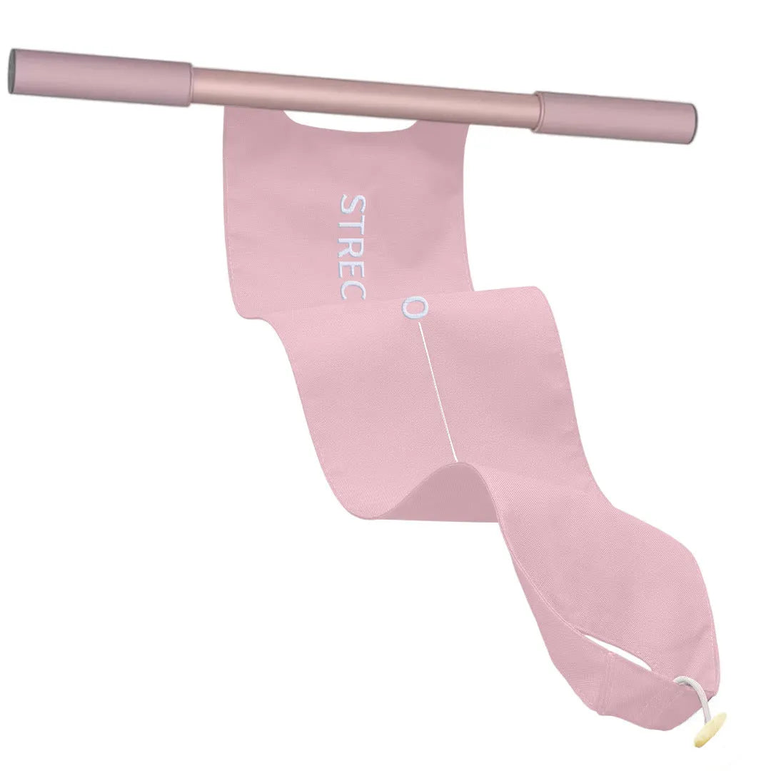 Grey and pink yoga stretching tool for shoulder back and hip flexibility on a fitness mat.