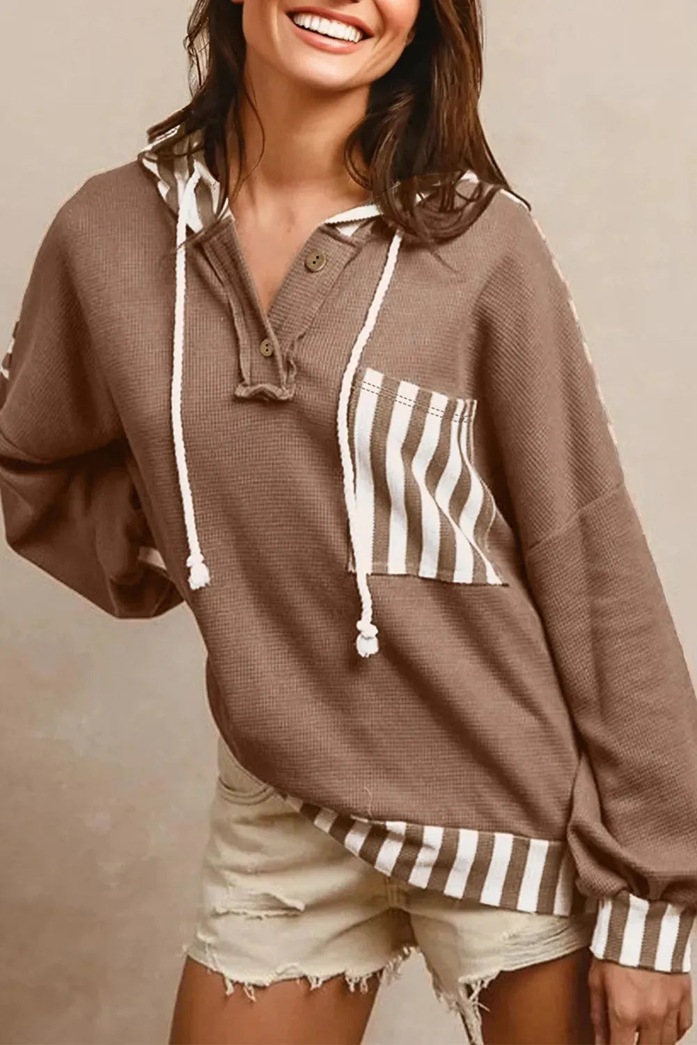 Straw yellow striped patchwork hoodie with waffle texture, button neck, and drawstring waist.