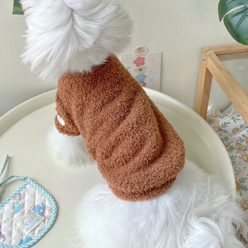 Double-sided cloud velvet pet clothes for small dogs or cats in various colours and sizes.