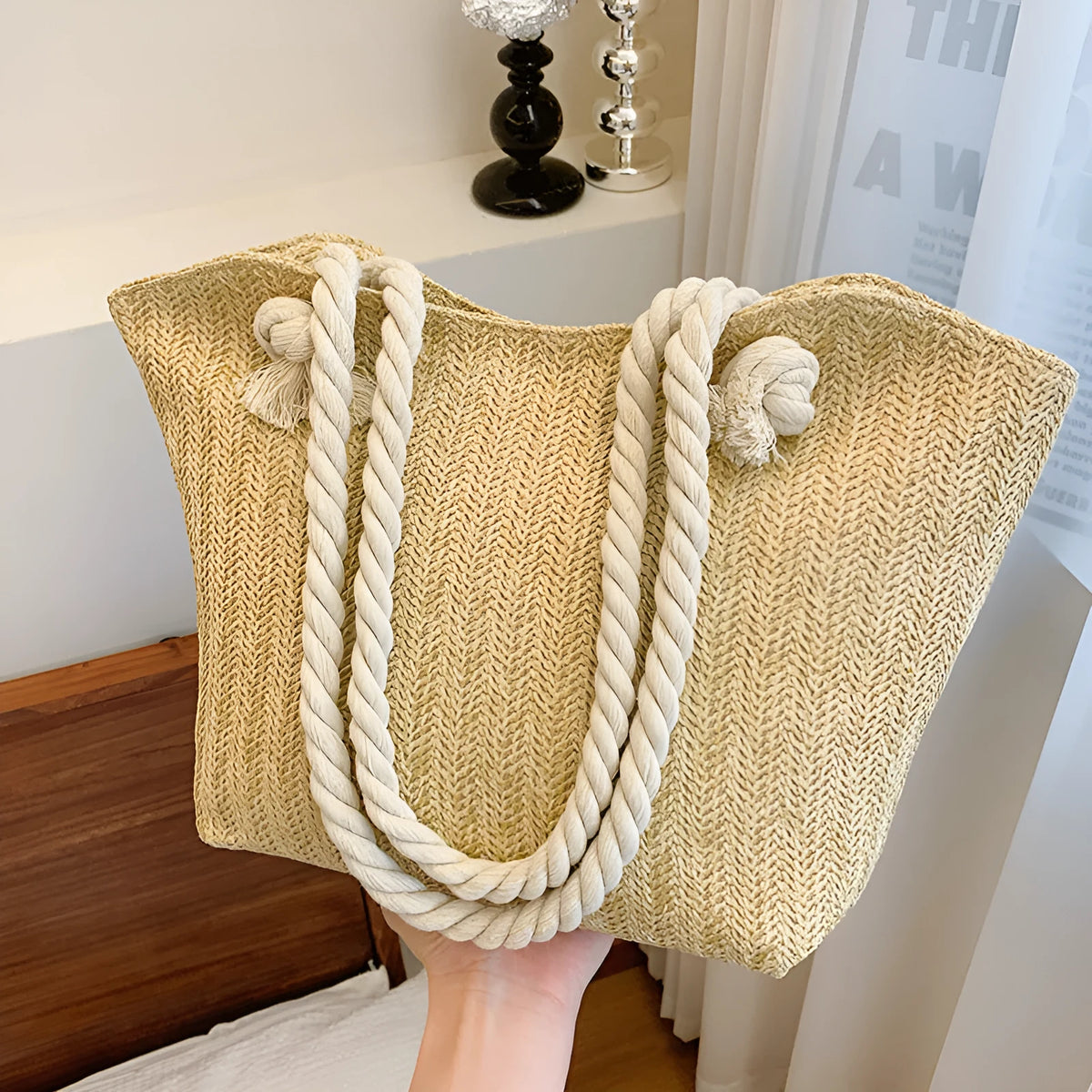 Women's straw shoulder handbag in white or khaki with clamshell opening, single strap, and phone bag