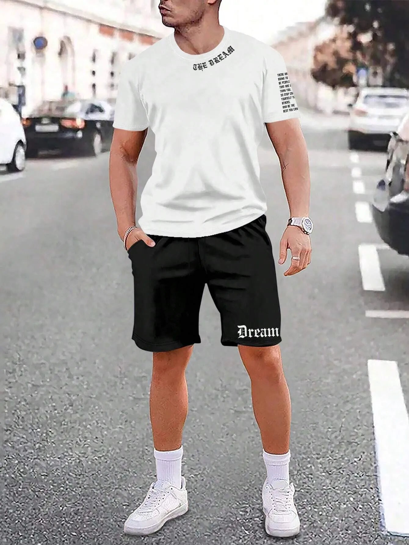 Men's blue sports style short-sleeved top and matching shorts laid flat