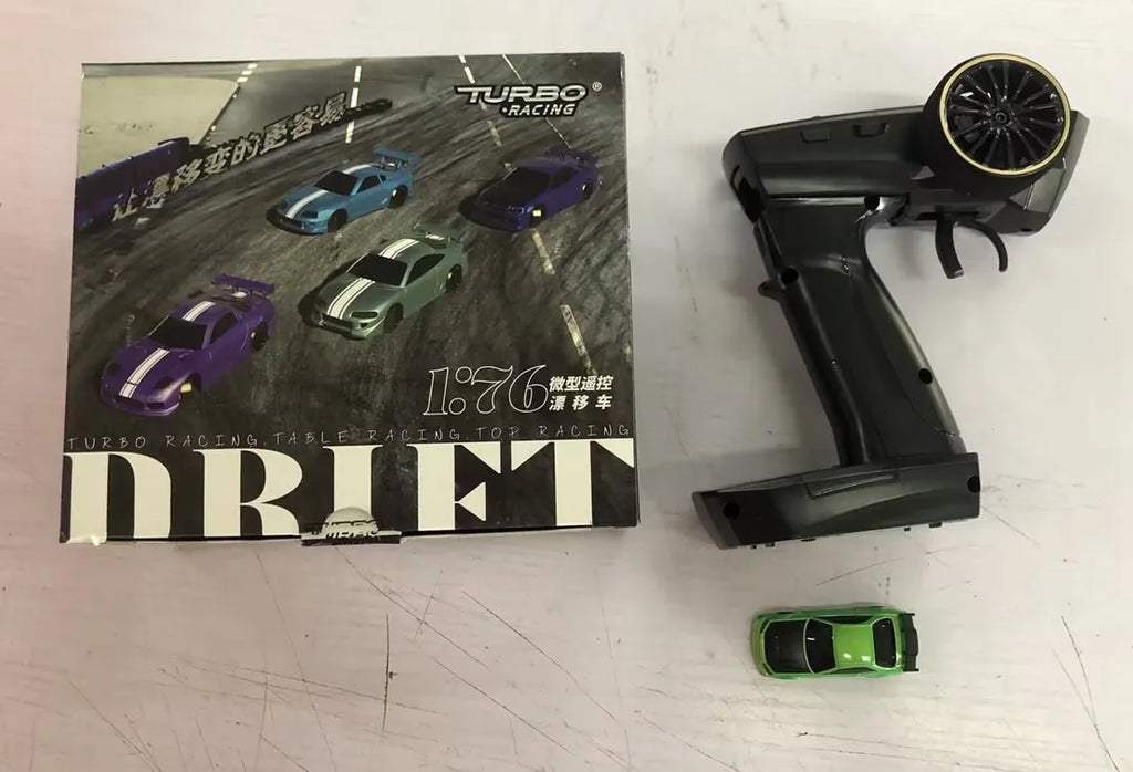 Blue Turbo Racing C64 1:76 scale gyro RC drift car with P21-SVC remote control