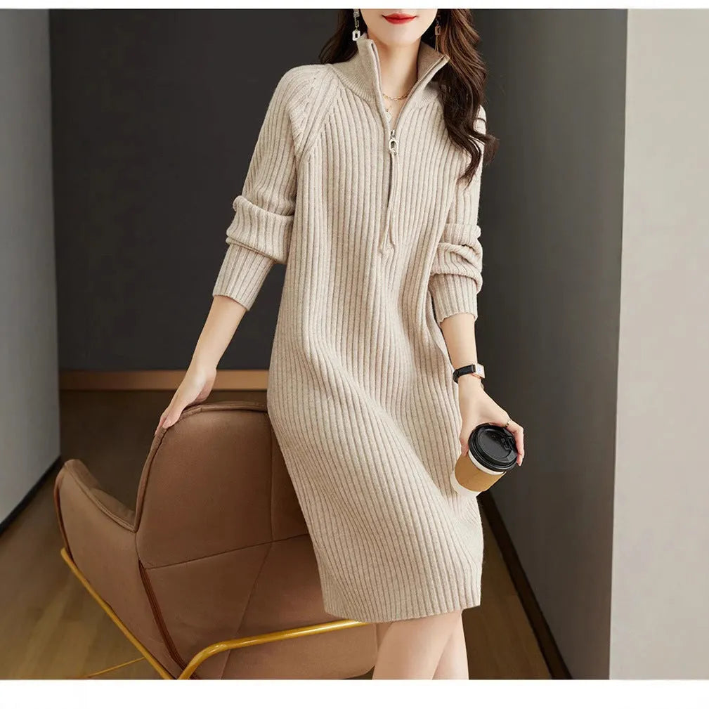 Beige half-zip woollen midi dress with long sleeves and a stand collar, laid flat.