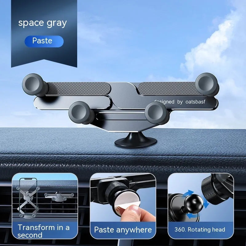 Silver aluminium alloy car phone holder with snap-on bracket mounted on a car air vent