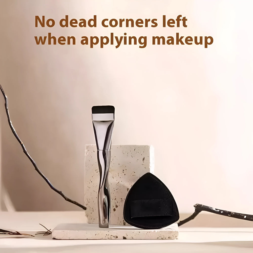 Spiral one-shaped black powder foundation brush with long handle on a white surface next to its storage bag.