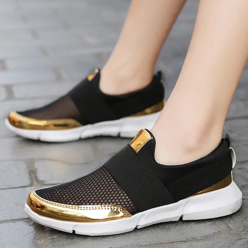 Women's low-cut casual sneaker in blue with mesh detail and a lightweight PU sole.