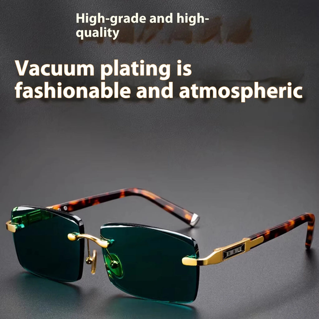 Frameless dark green crystal sunglasses with minimalist design on a case with cleaning cloth.