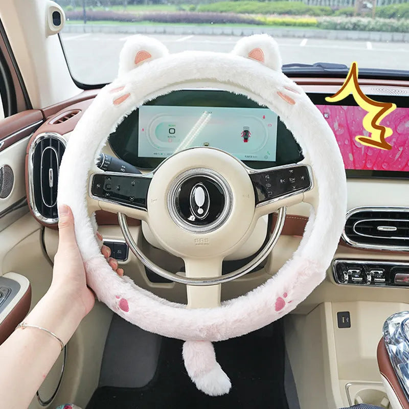 Plush cartoon animal steering wheel cover with embroidery, shown fitted on a car wheel.