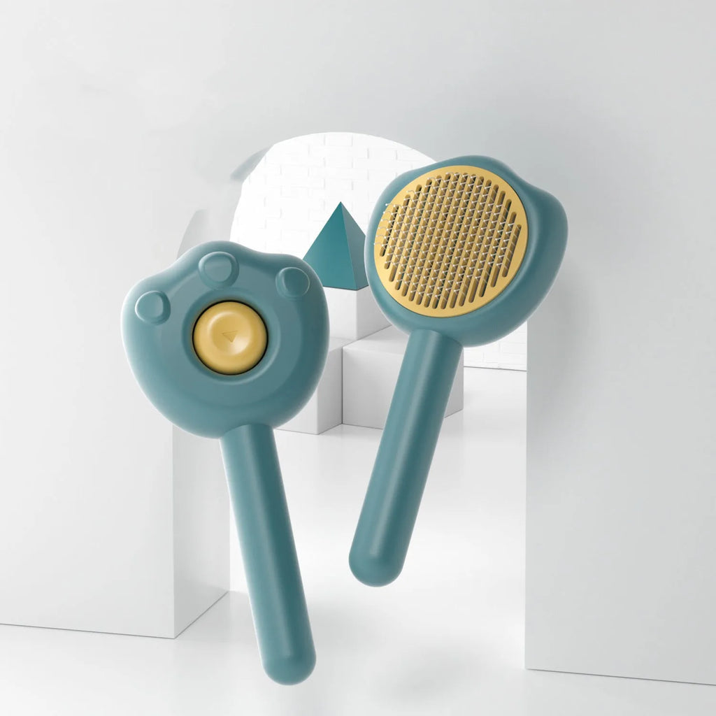 Blue self-cleaning pet grooming comb with retractable needles and compact 183mm design