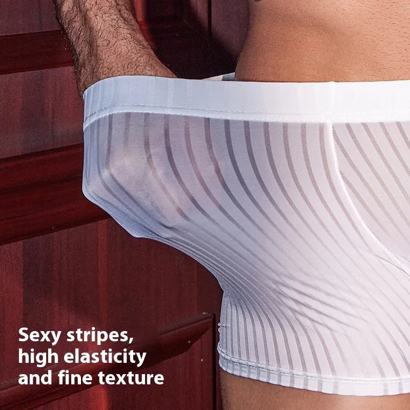 Men's black vertical stripe nylon boxer briefs laid flat, showing elasticated waistband and leg openings.