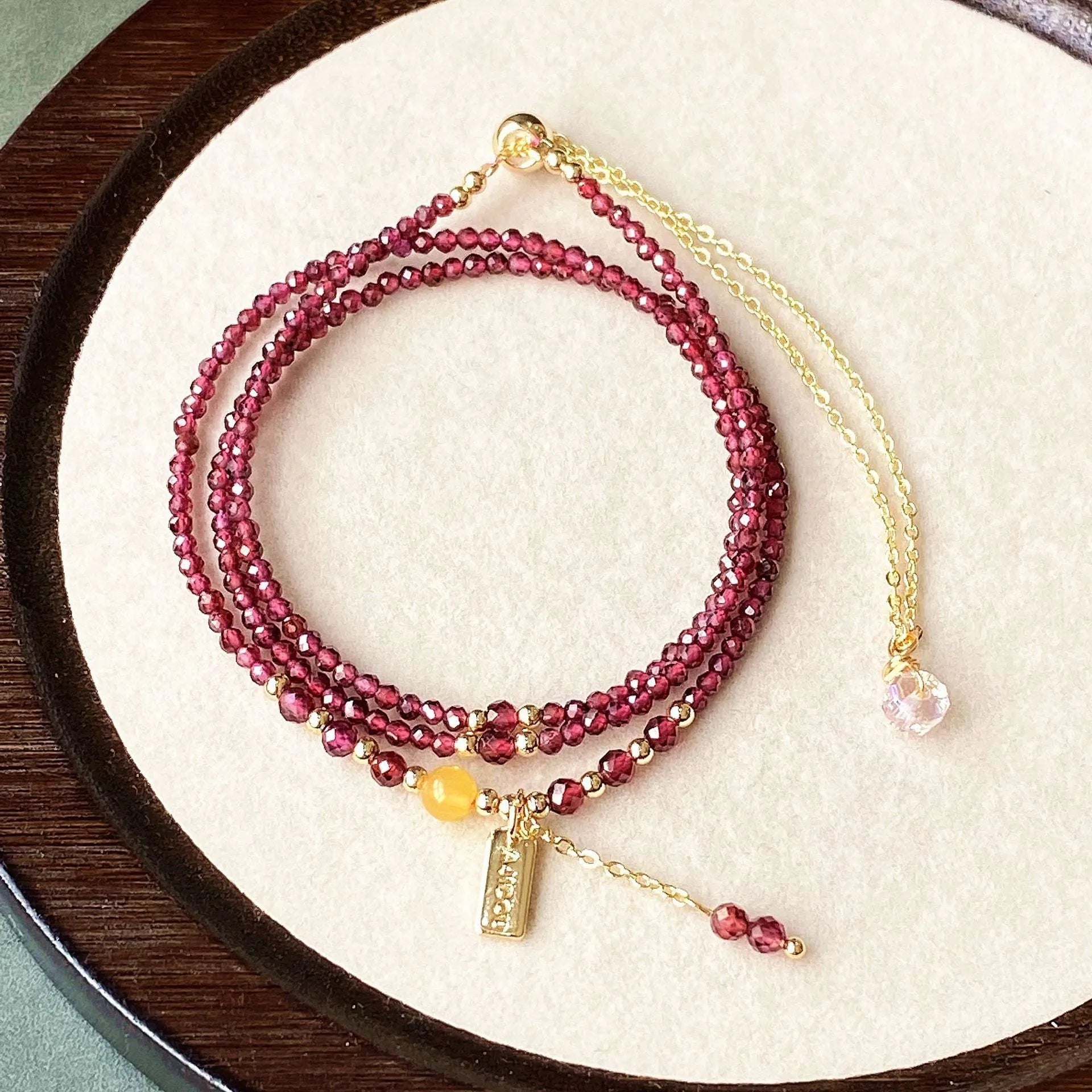 Garnet three circle bracelet with beeswax cut surface and electroplated finish