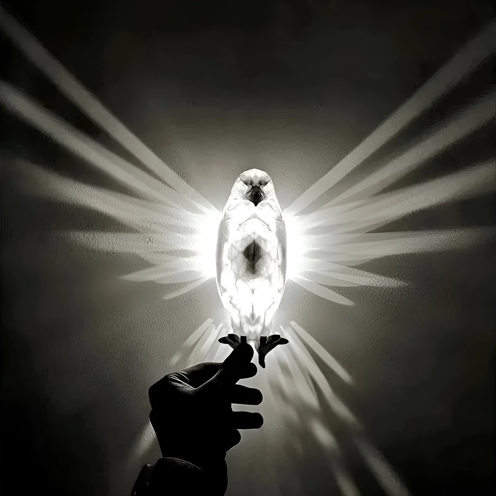 Eagle silhouette wall lamp with 3D printed resin body creating projection lighting effects