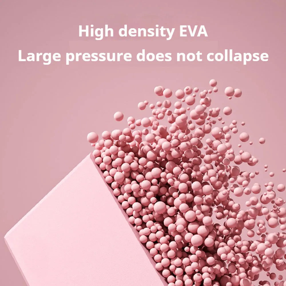 Solid blue EVA foam yoga brick with ridged hexagonal surface, shown next to a pink block.