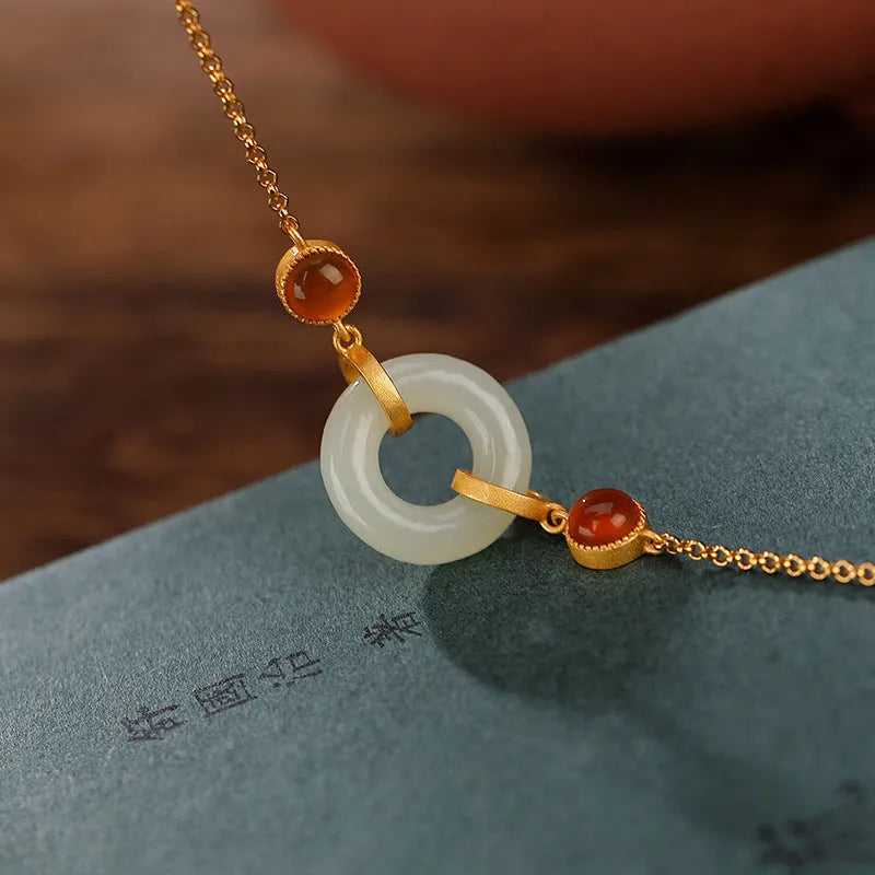 Women's silver and gold-plated bracelet with Hetian jade inlay and peace symbol buckle on adjustable band