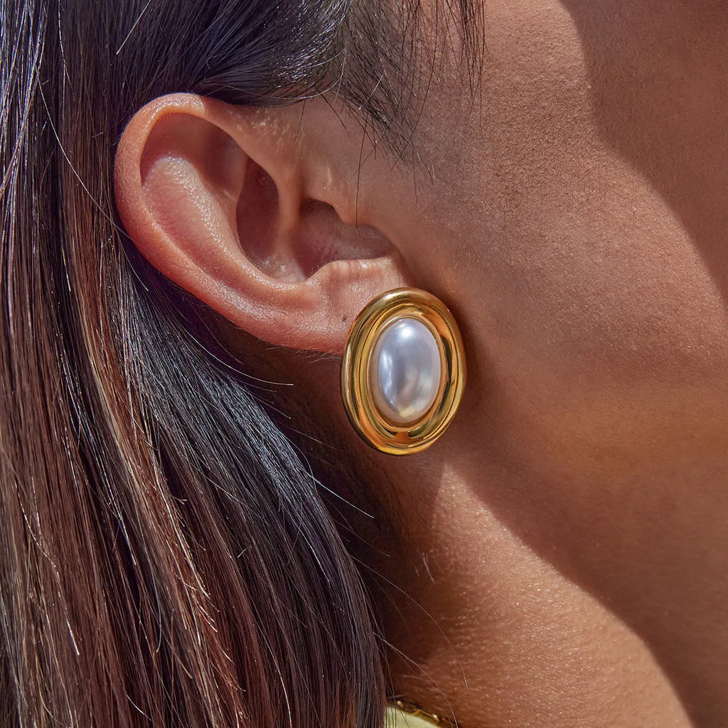 Stainless steel vintage pearl ear studs for women with silver tone finish and electroplated surface