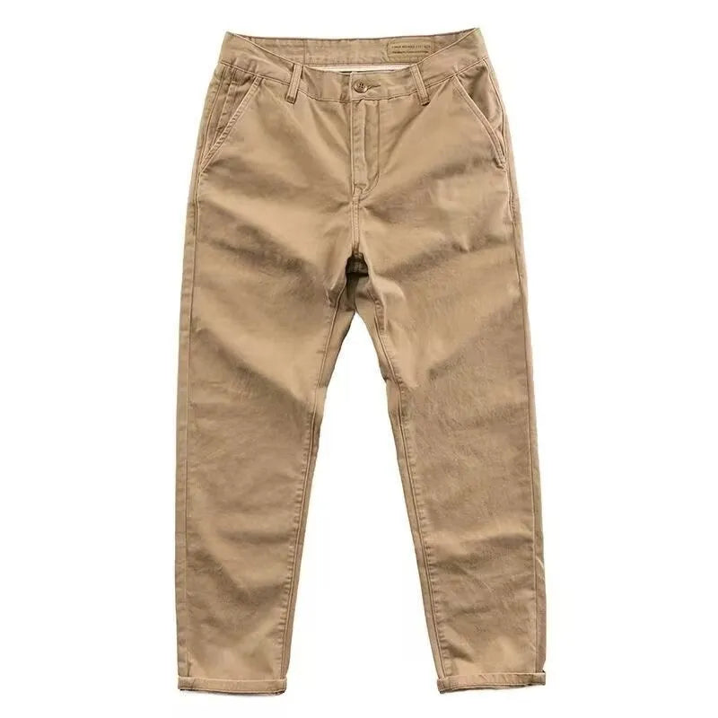 Men's slim straight-leg casual trousers in a washed cotton-polyester blend fabric.