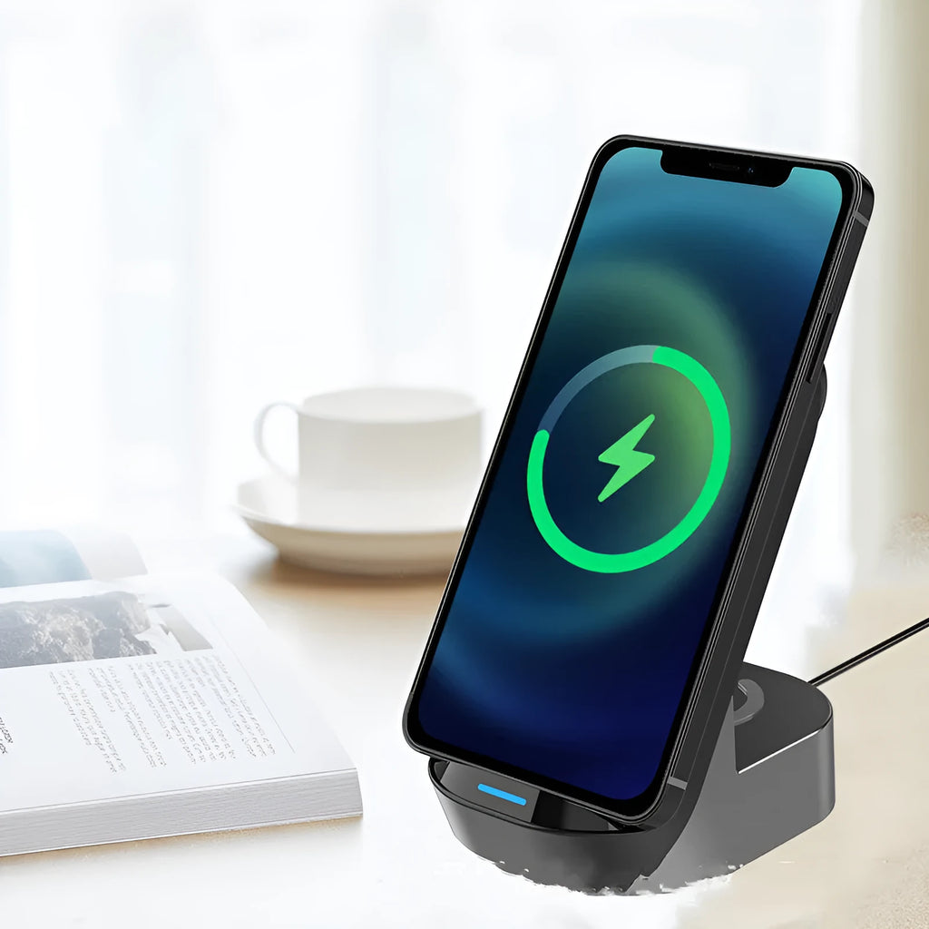 Black-grey foldable 3-in-1 wireless charger stand holding a phone vertically with a watch and earbuds charging on base.