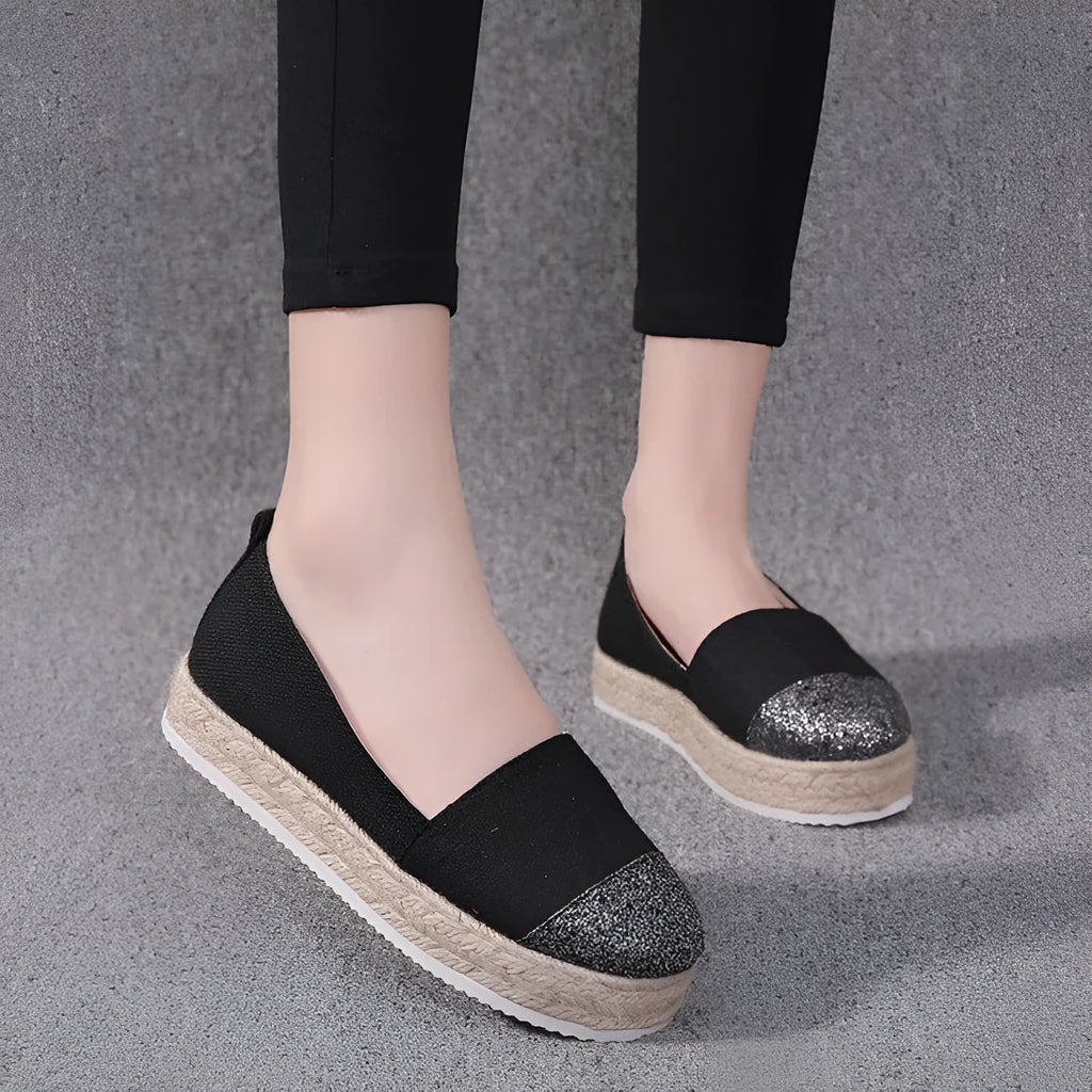 Plus size canvas flats in breathable cloth with round toe design and slip-on construction